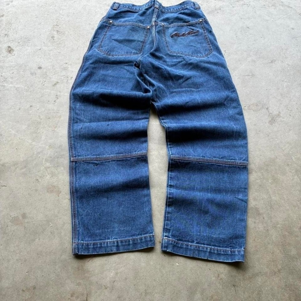 Karl Kani Jeans blue denim jeans with embroidery with hole under right pocket